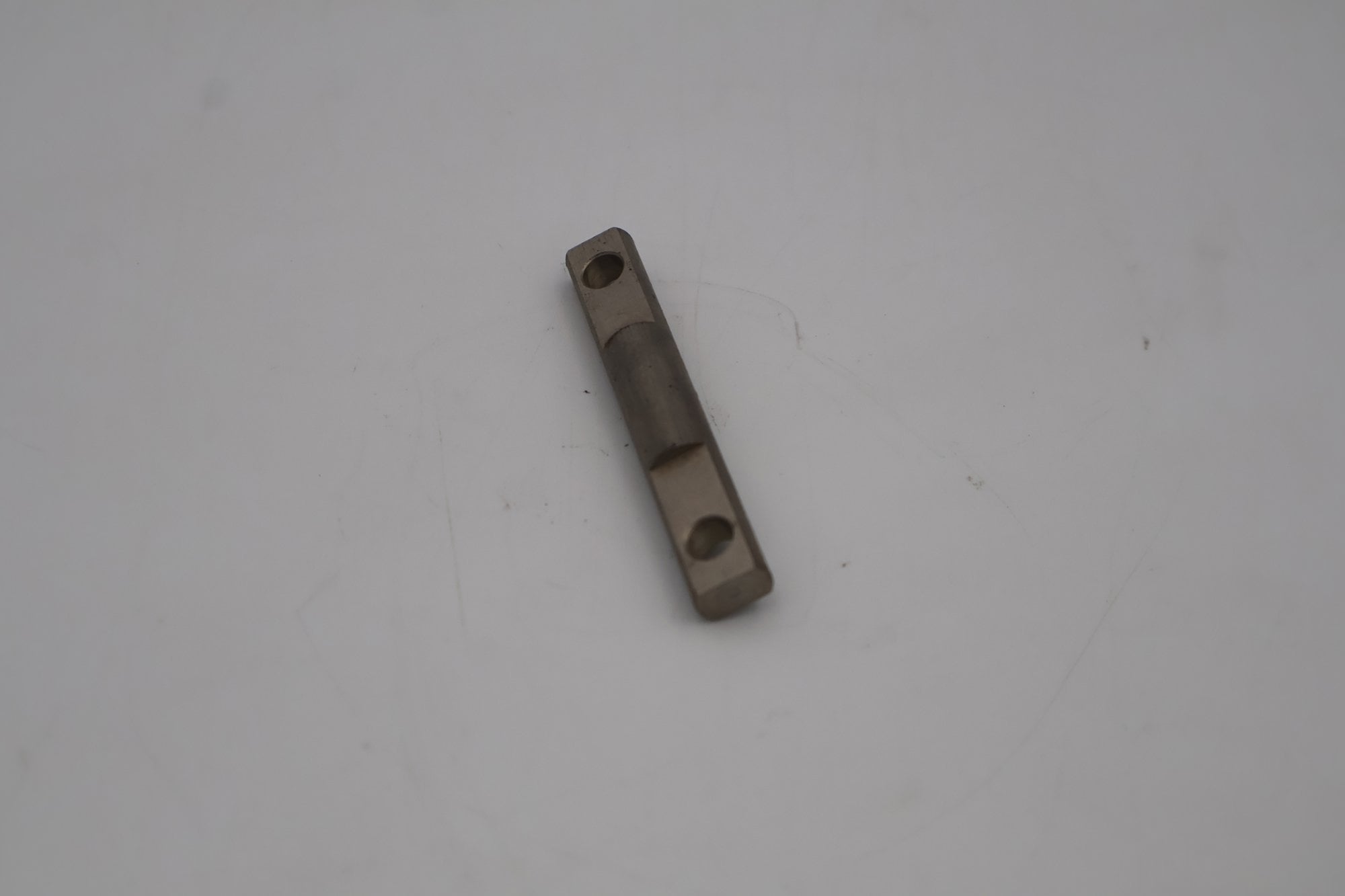Fixador do Trinco da Porta da Lavadora